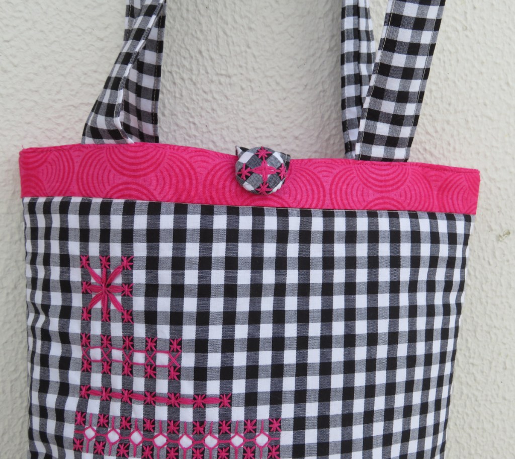covered button on tote